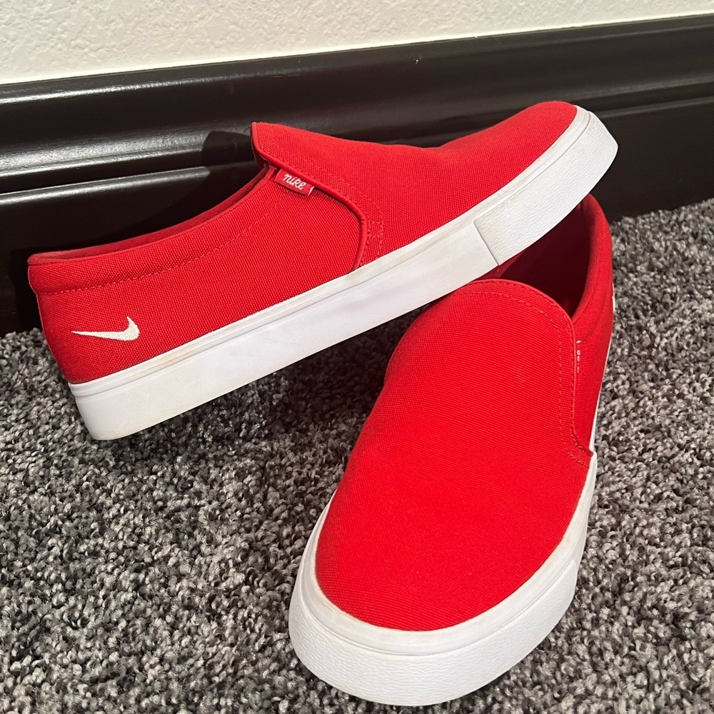Nike slip ons, bright red. Sporty and eye catching.